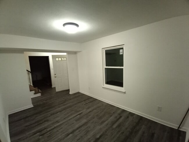 Building Photo - Three bedroom two and one half bath end unit townhome