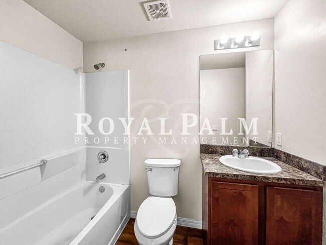 Building Photo - 4BR/2BA Duplex Living in Vistanna Villas + Washer & Dryer! — Space, Style, and Laundry Convenienc...