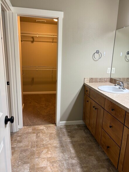 Primary bath and walk in closet - 1916 NW Kale Way
