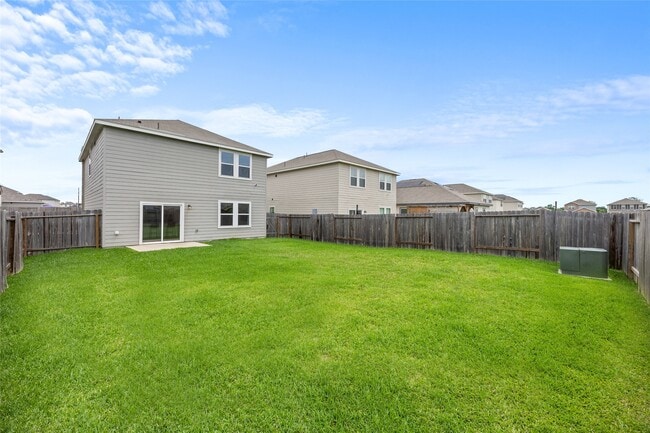 Building Photo - 7810 Pink Dahlia Dr