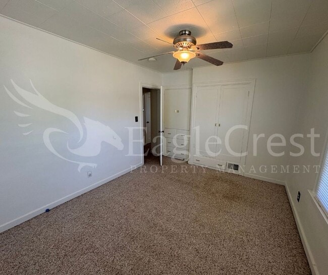 Building Photo - Three Bedroom, Two Bathroom House with Fenced Yard and Outdoor Fireplace