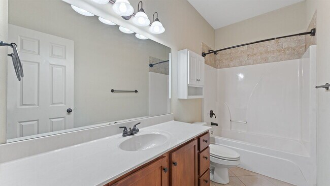 Building Photo - Charming 4-Bedroom Fayetteville Retreat with Granite Accents & Warm Fireplace!