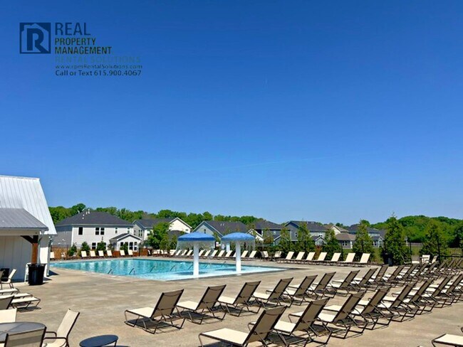 Building Photo - Great 4 bd 2.5 ba with attached garage and large deck!