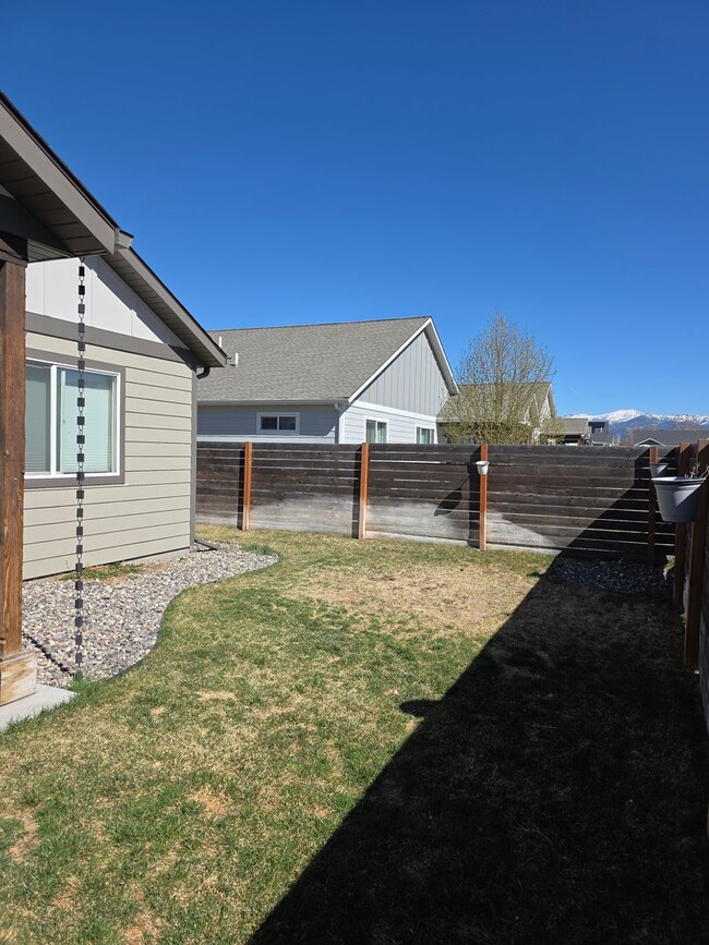 Building Photo - $500 OFF First Month's Rent! Spacious 3BR/2BA Home in Quiet Belgrade Neighborhood with Fenced Bac...