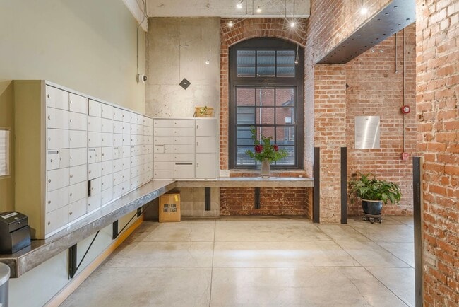 Building Photo - Historic Chown Pella Lofts - east facing studio w/parking/most utilities/rooftop deck