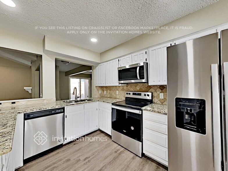 Building Photo - 3200 Whisper Wood Ct