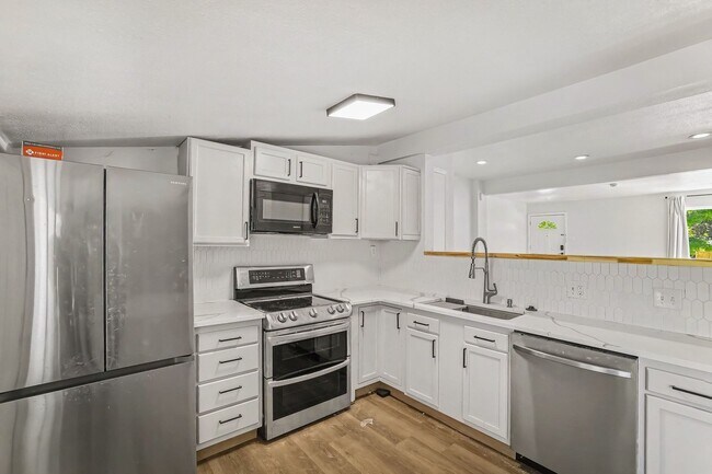 Building Photo - Charming Harvey Park Home with Large Yard & Fireplace