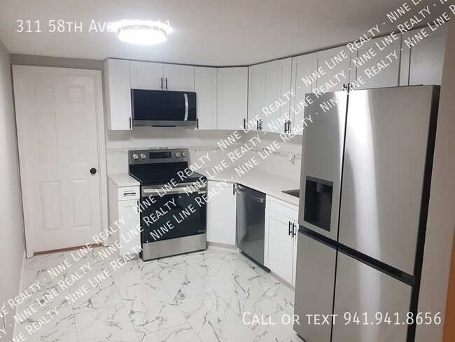 Building Photo - 311 58th Ave E