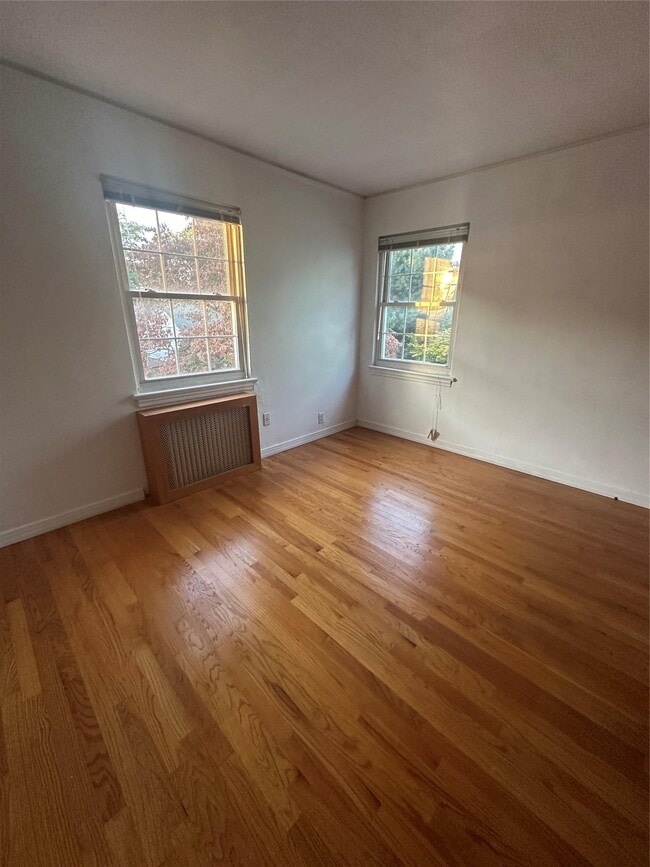 Building Photo - 217-21 51st Ave