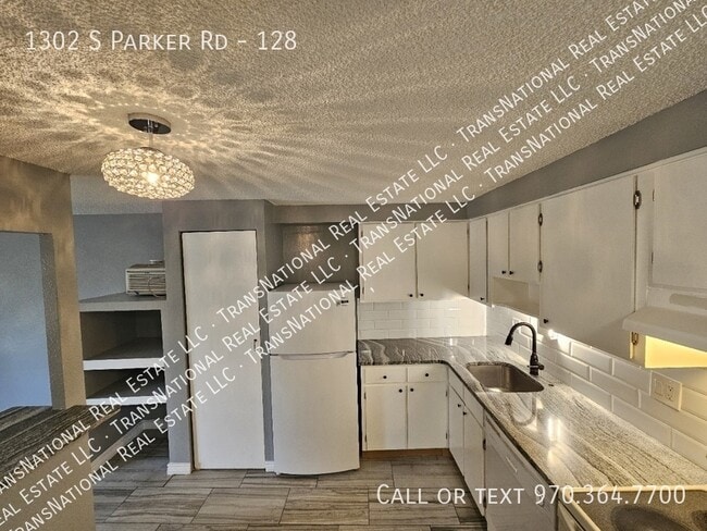 Building Photo - 1302 S Parker Rd