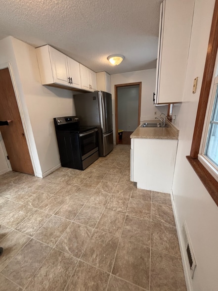 Building Photo - 8471 Hilo Ln S