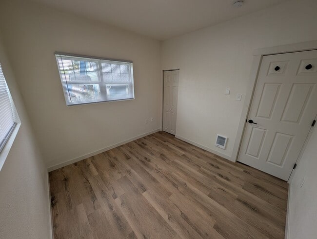 Building Photo - Adorable Four Bedroom w/ Fenced Yard Avail...