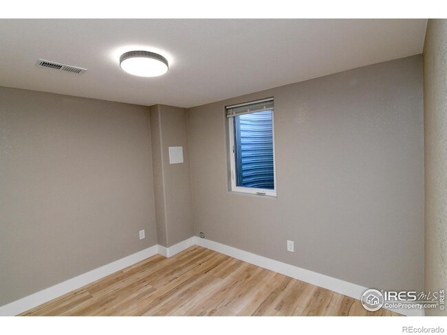 Building Photo - Remodeled home with separate finished base...