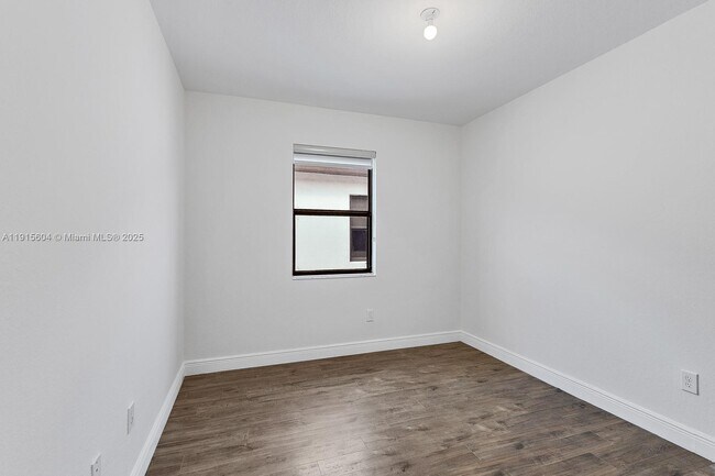 Building Photo - 8725 NW 102nd Ct