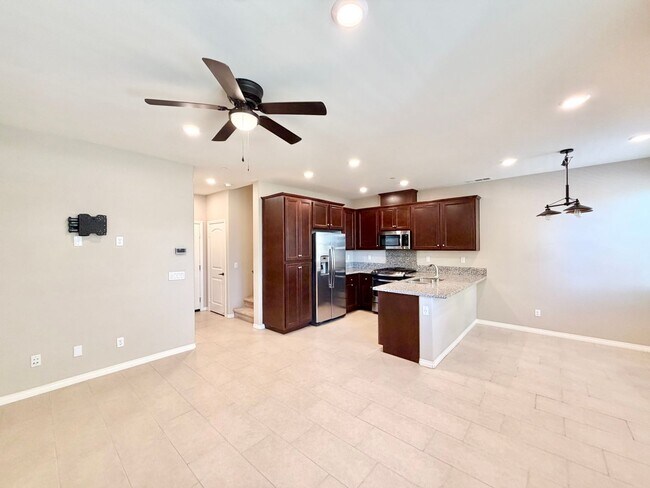 Building Photo - Move-In Ready 2 Bedroom 2.5 Bathroom Condo with LOFT & 2 Car Garage