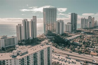 Building Photo - 19380 Collins Ave