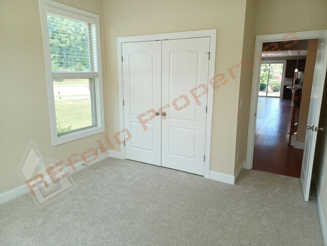 Building Photo - Luxury 5 Bedroom, 3 Bath, 2-Car Garage End Unit Townhouse w/1st level Primary Suite + Guest Suite...