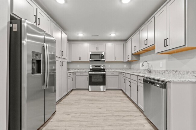 Building Photo - "Brand-New Townhome Awaits!"
