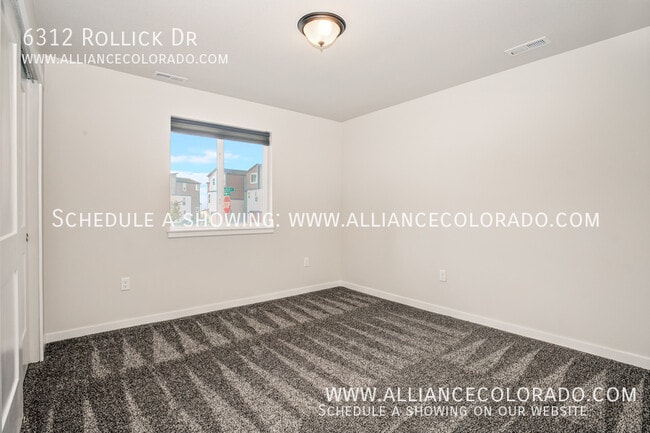Building Photo - 6312 Rollick Dr