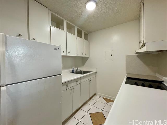 Building Photo - 98-1038-1038 Moanalua Rd