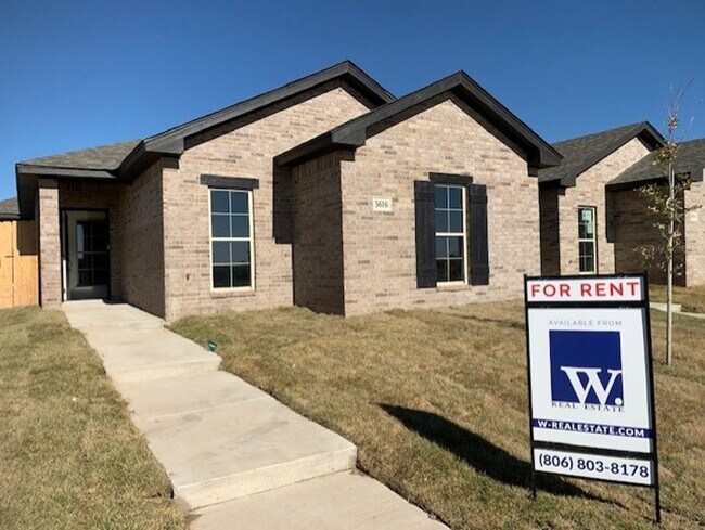 Building Photo - Stunning New 3/2 Townhomes