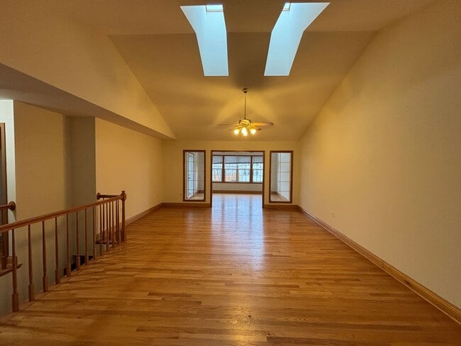 Building Photo - Spacious 3BR/3BA Condo with Finished Basement + 2-Car Garage — Available Now