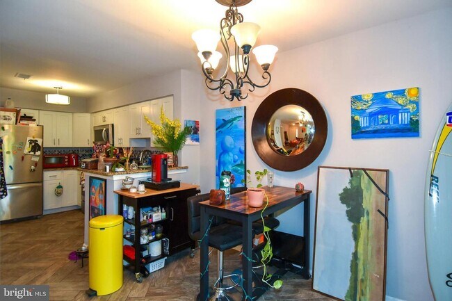 Building Photo - Experience the vibrant lifestyle and natural beauty that make Reston such a sought after place to...