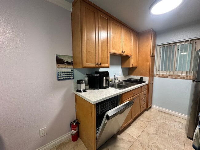 Building Photo - Prime Location! Pet-Friendly 1-Bedroom Condo Near Beach & Naval Bases