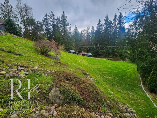 Building Photo - Light-Filled View Home with Vaulted Ceilings & Warm Wood Finishes