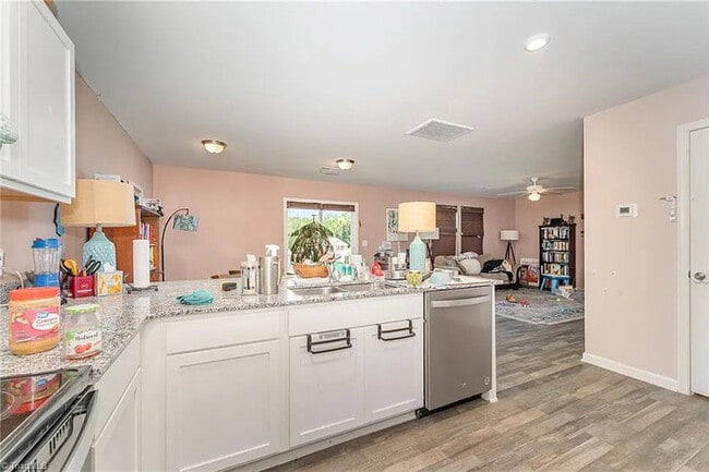 Building Photo - Earn Wealth While Leasing - Like a Homeown...