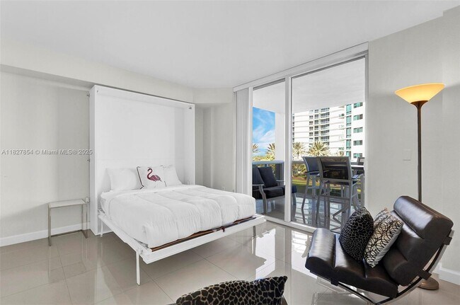 Building Photo - 10275 Collins Ave