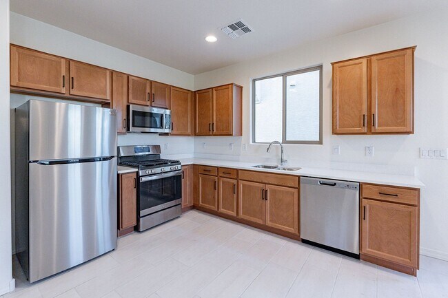 Building Photo - Three Bedrooms! Newer Neighborhood - conve...