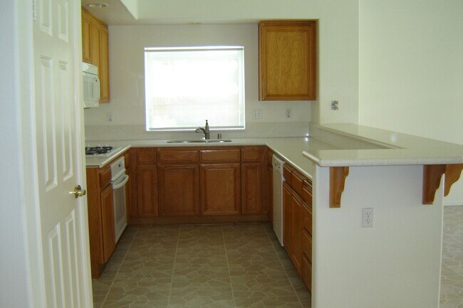 Building Photo - Spacious single-level home located on a quiet corner lot in a well-established Oceanside neighbor...