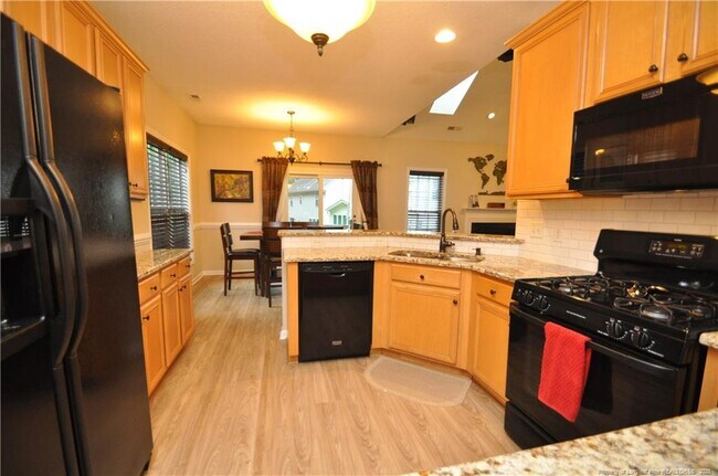Building Photo - 5633 Yates Garden Ln