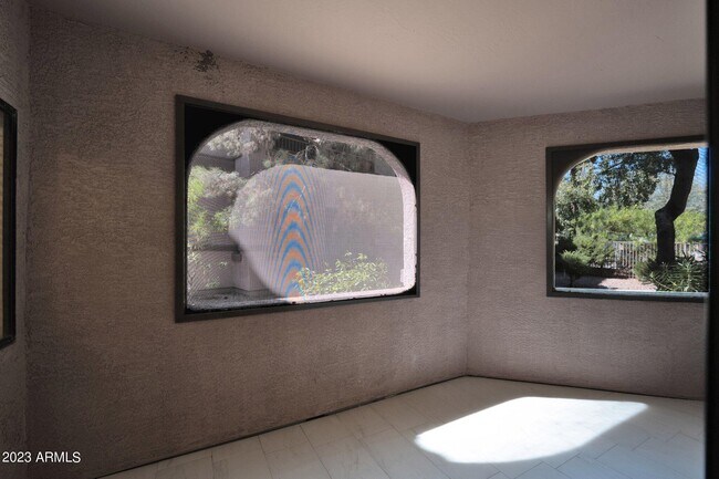 Building Photo - 9555 E Raintree Dr