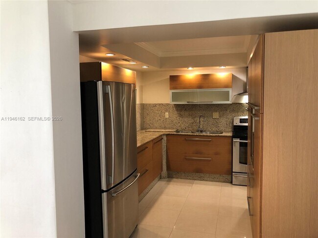 Building Photo - 5555 Collins Ave