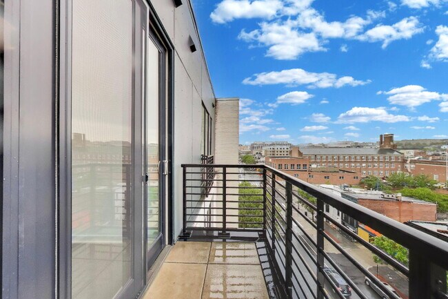 Building Photo - Top floor residence in elevator building with sweeping views.
