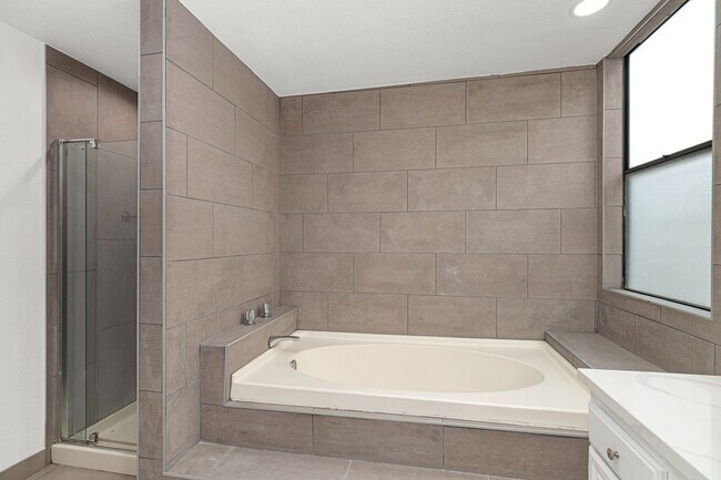 Primary en-suite, view 3 - separate tub (toilet & walk in shower wouldn't fit into photo) - 1745 S Bentley Ave