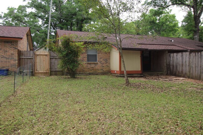 Building Photo - Brick Duplex Near NAS Pensacola & Corry Station with Tile Flooring Throughout and Fully Fenced Ba...