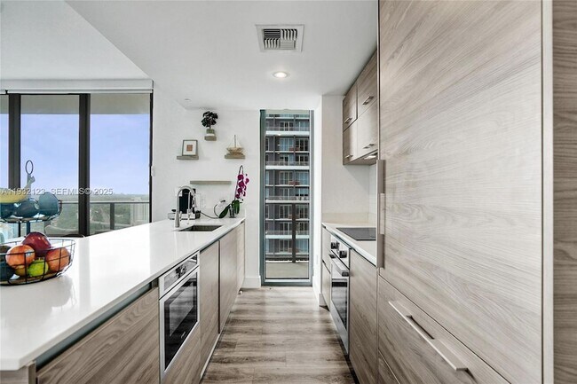 Building Photo - 1300 S Miami Ave