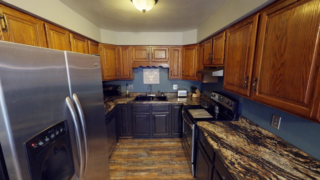 Updated kitchen countertops, sink, garbage disposal, fridge with ice maker and new dishwasher. - 508 Crab Apple Ct