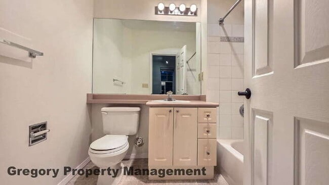 Building Photo - Sunlit & Spacious Ground-Level Condo | 12-Foot Ceilings, Luxury Amenities & Ideal Locale