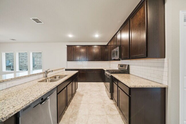 Building Photo - 8907 Arundal Garden