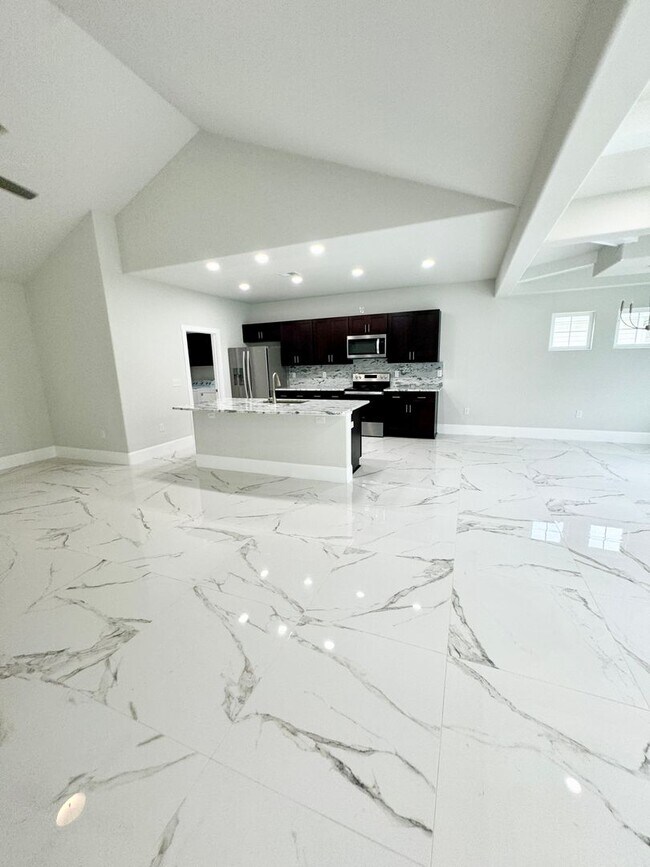 Building Photo - LOOK AT THIS ONE! BEAUTIFUL home with a pond view right outside the back patio!