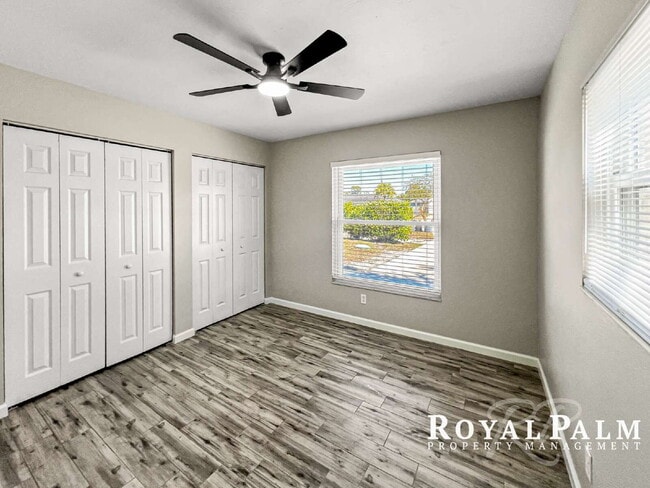 Building Photo - Tree-Lined 2BR/1BA Fort Myers Duplex with Fenced Yard, Storage Shed & In-Unit Laundry!