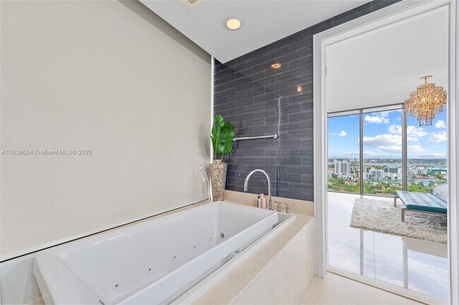 Building Photo - 9705 Collins Ave