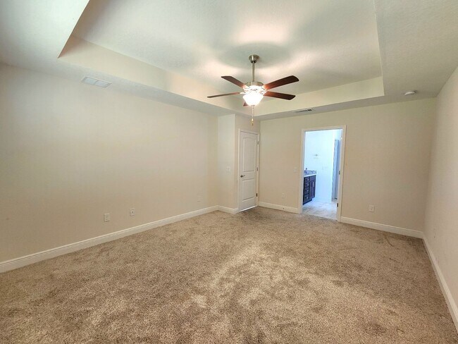 Building Photo - Welcome to this stunning 4-bedroom, 3-bath...