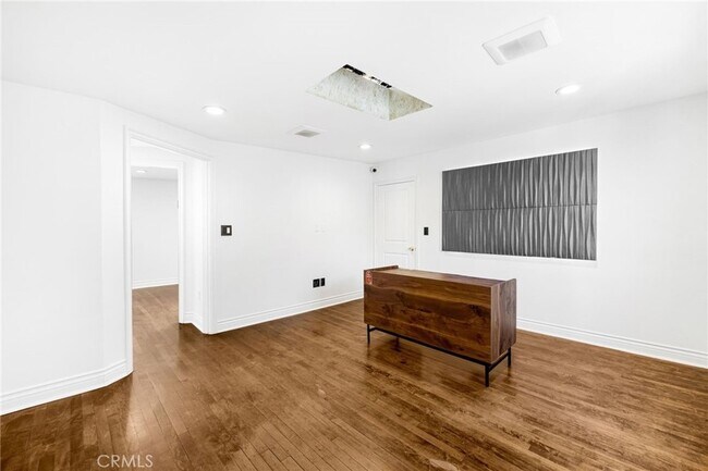 Building Photo - 6000 Woodman Ave