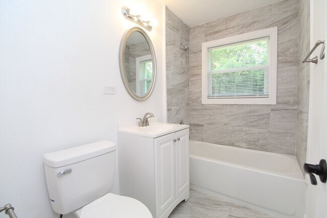 Building Photo - 4BR Home with LVP Flooring, Open Layout & Large Backyard Near Dogwood