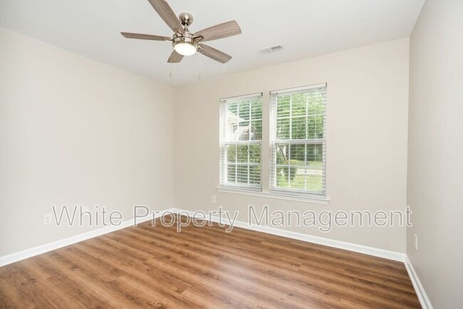 Building Photo - 6305 Trevor Simpson Dr